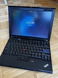 My X210 with PopOS running on the display