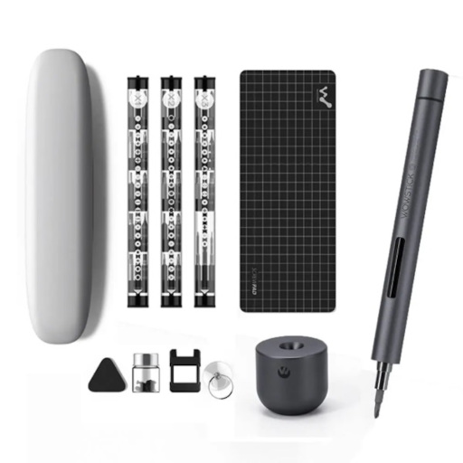 A pen-sized electric screwdriver with several tubes of screwdriver tips, a work mat, and a carrying case