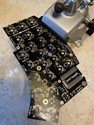 A close up of assembling the Kyria circuit board